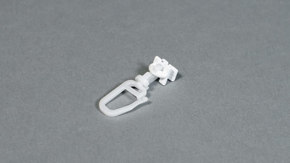 Drehgleiter mit Faltenlegehaken, drehbar 6 mm, Teflon Artikelbild